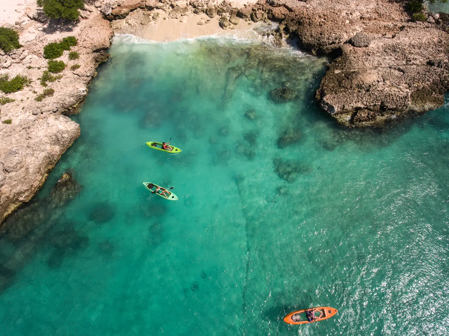 Kayaks on turquoise water in Aruba